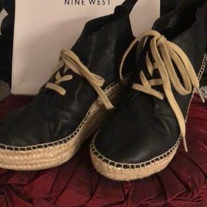 Nine West leather closed toe wedges.